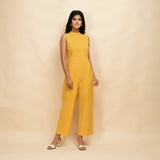 Front View of a Model wearing Yellow Handspun Cotton Princess Line Sleeveless Jumpsuit