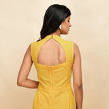 Back View of a Model wearing Yellow Handspun Cotton Princess Line Sleeveless Jumpsuit