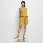Front View of a Model wearing Yellow Handspun Cotton Vegetable Dyed Crop Top