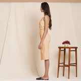 Left View of a Model wearing Yellow Knee Length Cotton Sheath Dress