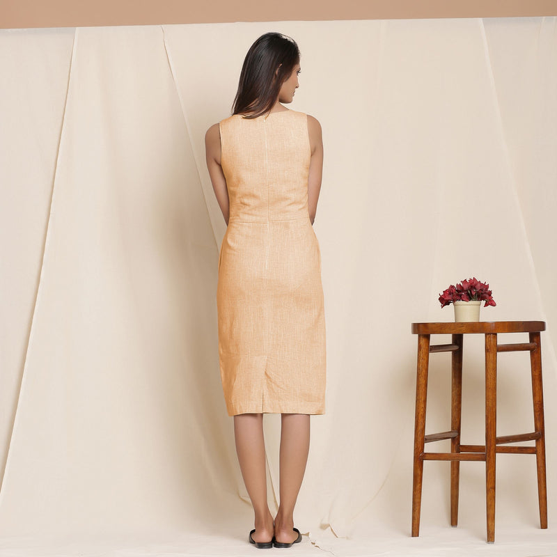 Back View of a Model wearing Yellow Knee Length Cotton Sheath Dress