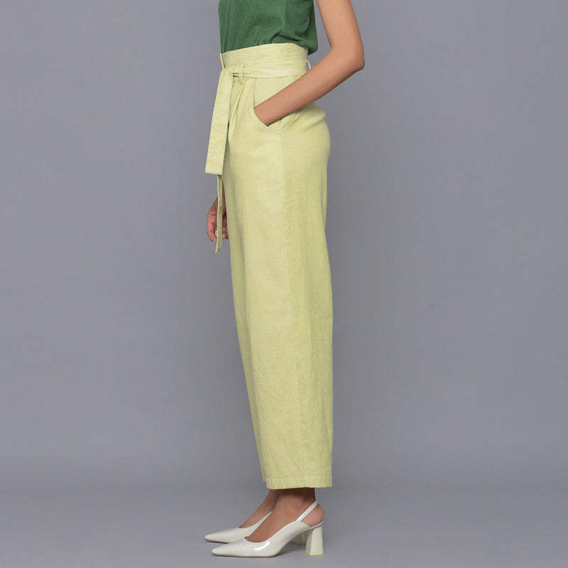 Left View of a Model wearing Yellow Pistachio Cotton Corduroy Pant