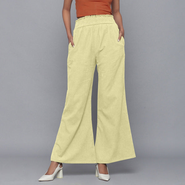 Front View of a Model wearing Yellow Pistachio Corduroy Striped Bootcut Pant