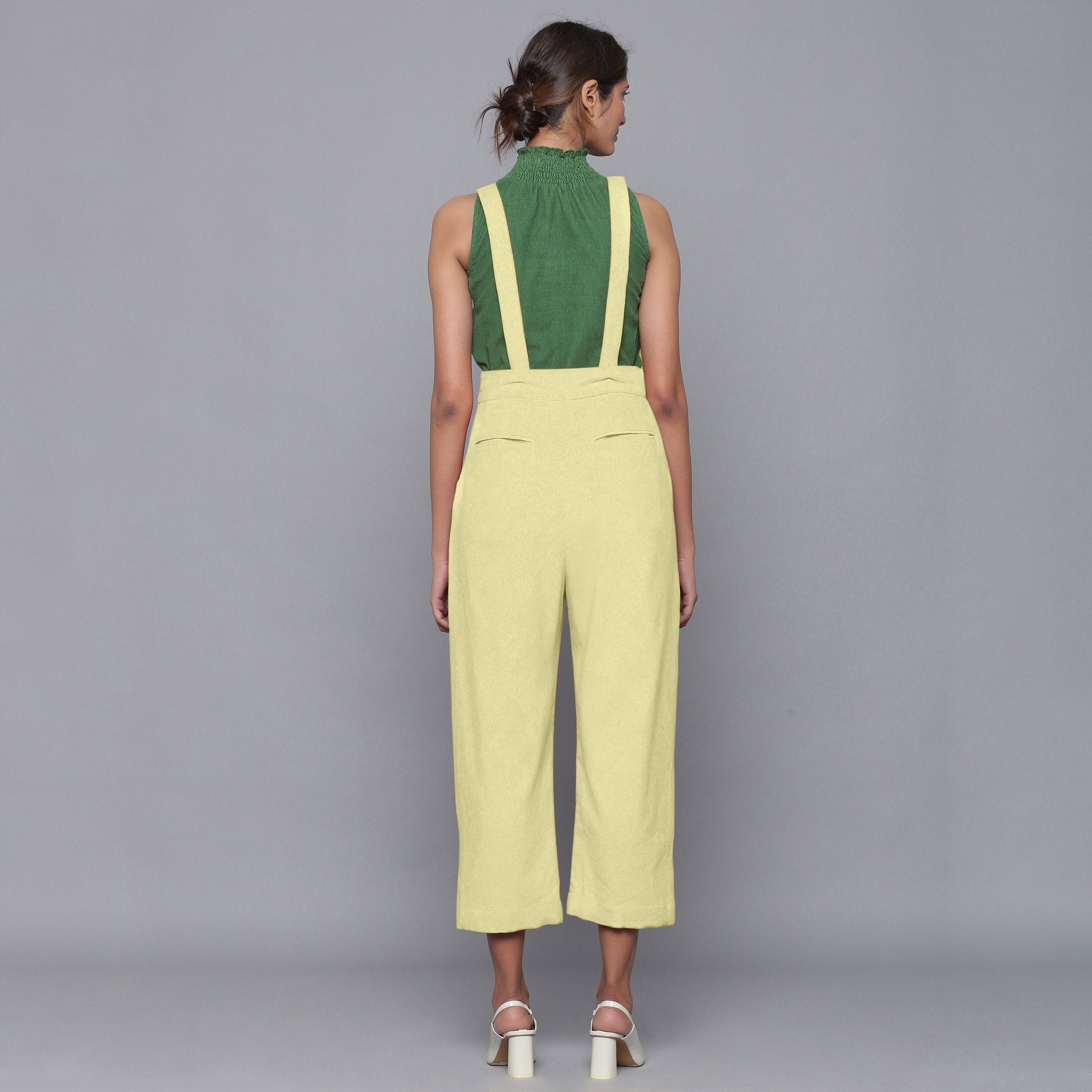 Back View of a Model wearing Yellow Pistachio Cotton Corduroy Dungaree