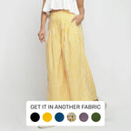 Left View of a Model wearing Yellow Striped Wide Legged Cotton Pant