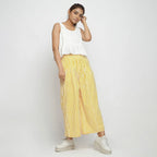 Front View of a Model wearing Yellow Striped Wide Legged Cotton Pant