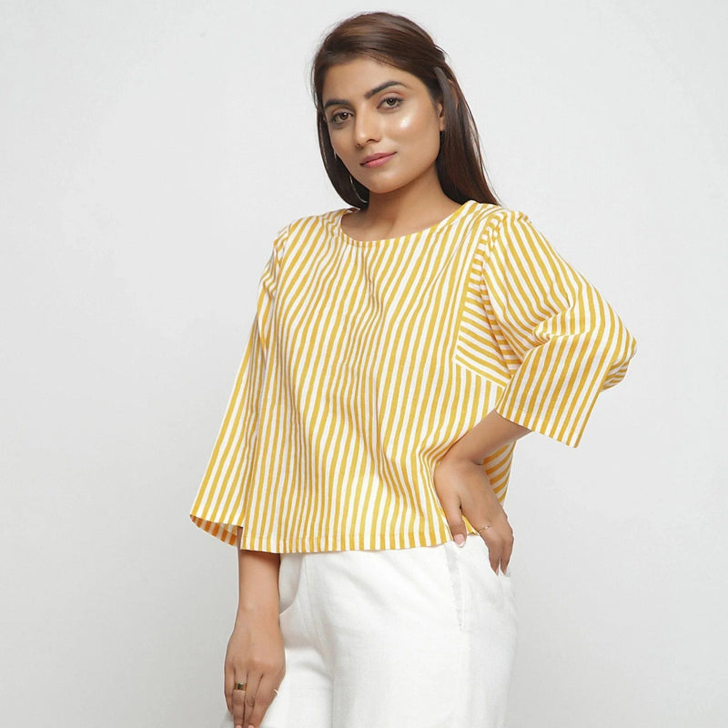 Front View of a Model wearing Yellow Hand Screen Printed Straight Top