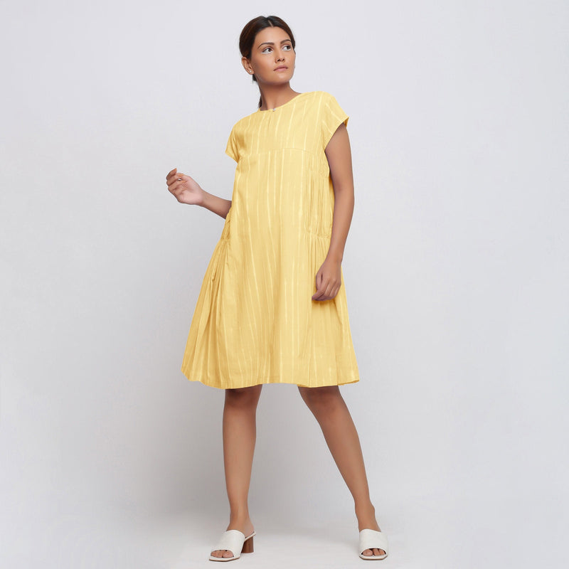 Front View of a Model wearing Yellow Tie Dye Yoked Knee Length Dress