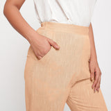 Front Detail of a Model wearing Yellow Yarn Dyed Mid Rise Tapered Pant