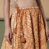 Front Detail of a Model wearing 6-Way Convertible Rust Sandstone Tie Dye Skirt Dress