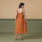 Back View of a Model wearing 6-Way Convertible Rust Sandstone Tie Dye Skirt Dress