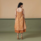 Back View of a Model wearing 6-Way Convertible Rust Sandstone Tie Dye Skirt Dress