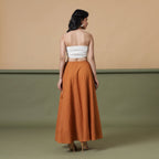 Back View of a Model wearing 6-Way Convertible Rust Sandstone Tie Dye Skirt Dress
