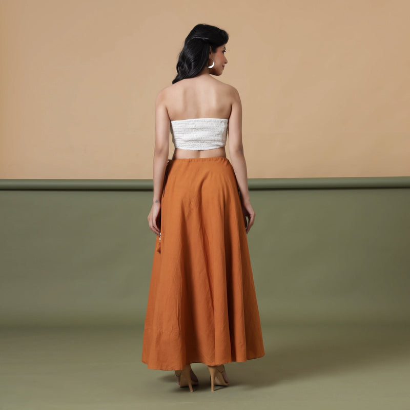 Back View of a Model wearing 6-Way Convertible Rust Sandstone Tie Dye Skirt Dress
