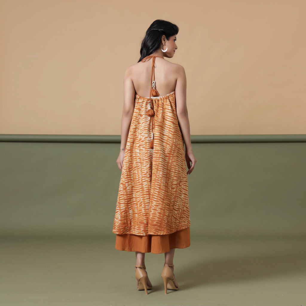 Back View of a Model wearing 6-Way Convertible Rust Sandstone Tie Dye Skirt Dress