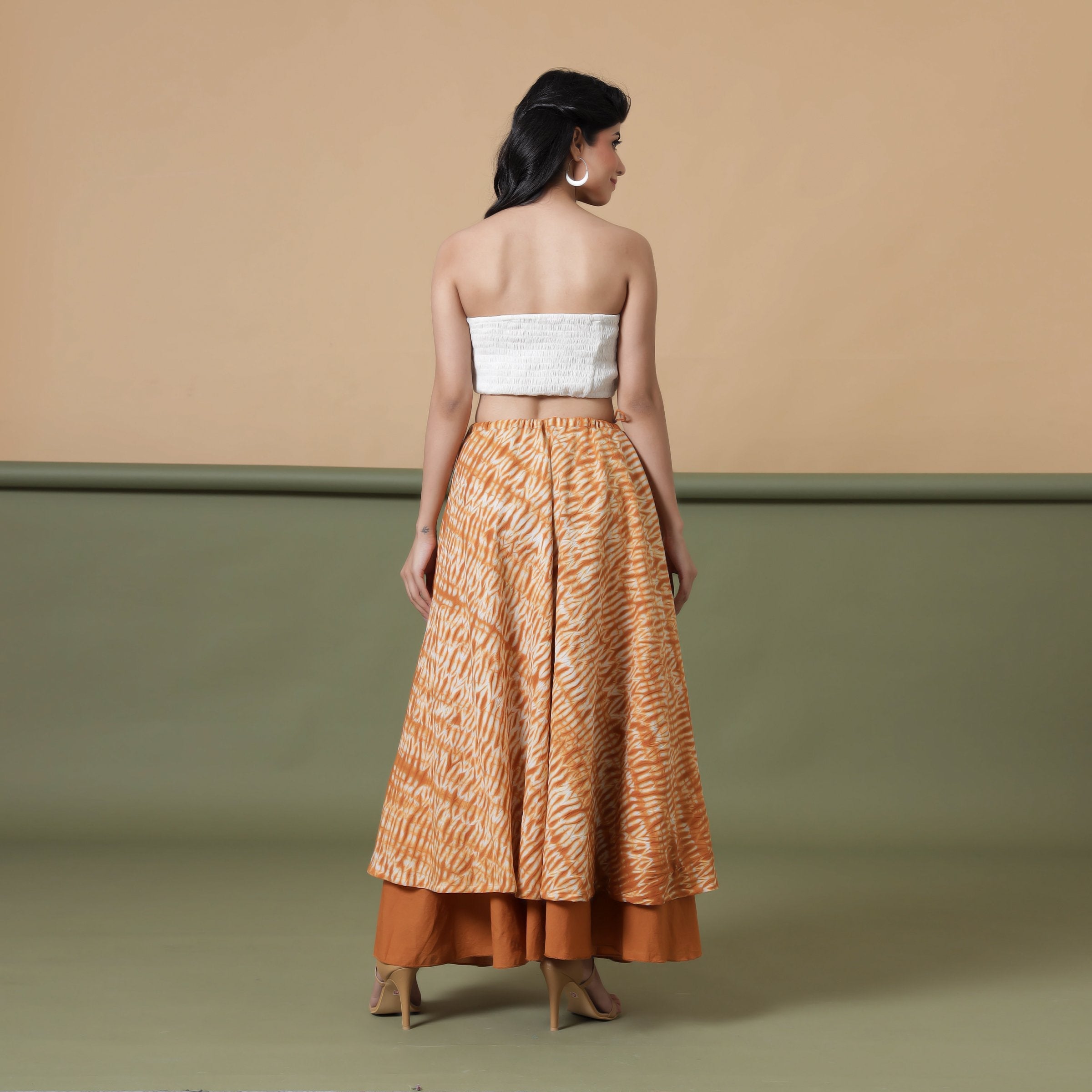 Back View of a Model wearing 6-Way Convertible Rust Sandstone Tie Dye Skirt Dress