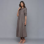 Left View of a Model wearing Ash Grey Flannel Gathered Dress