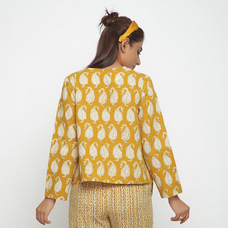 Back View of a Model wearing Bagru Block Print Mustard High Low Top