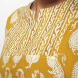 Front Detail of a Model wearing Bagru Block Print Mustard High Low Top