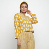 Front View of a Model wearing Bagru Block Print Mustard High Low Top