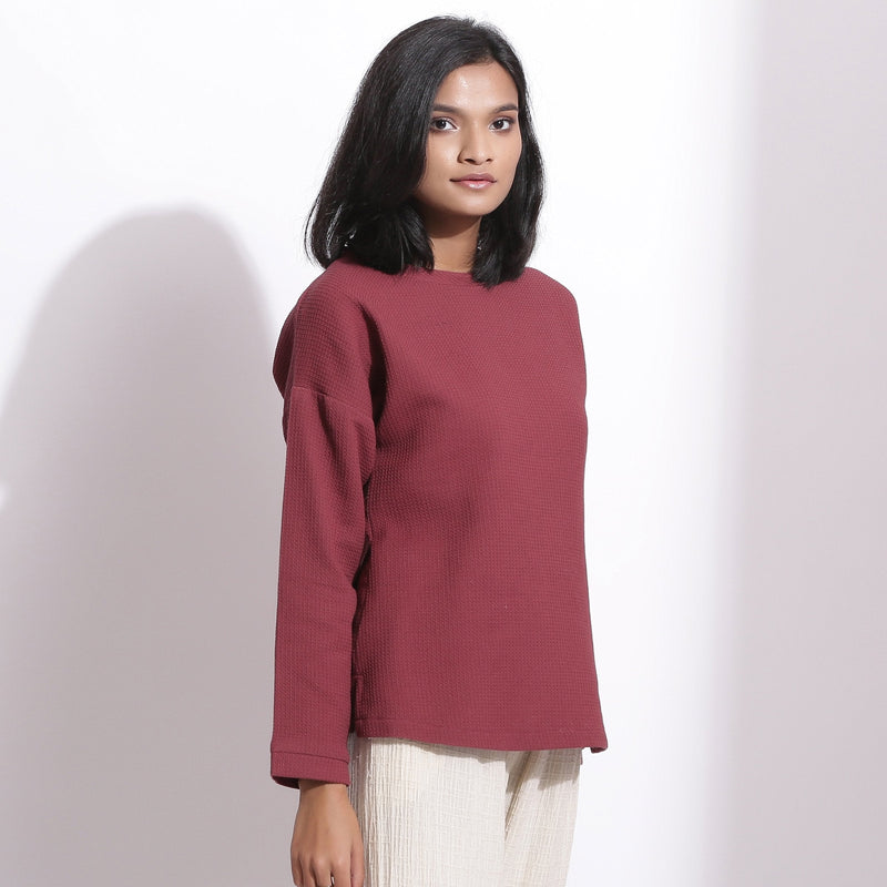 Right View of a Model wearing Barn Red Cotton Waffle Drop Shoulder Top