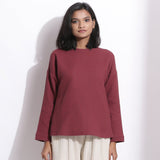 Front View of a Model wearing Barn Red Cotton Waffle Drop Shoulder Top