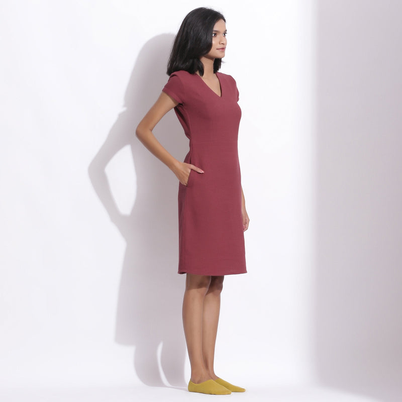 Right View of a Model wearing Barn Red Cotton Waffle V-Neck Dress