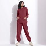 Front View of a Model wearing Barn Red Hoodie Sweatshirt and Pants Set