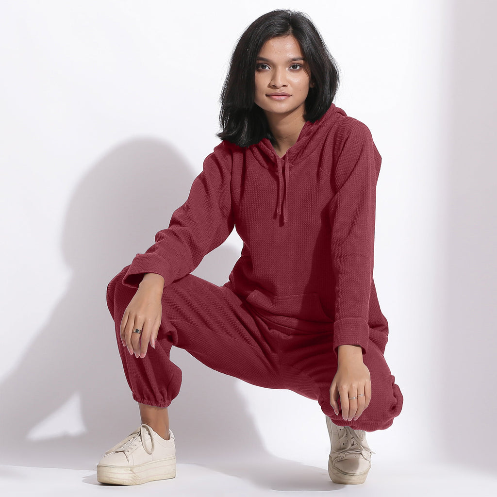 Front View of a Model wearing Barn Red Hoodie Sweatshirt and Pants Set