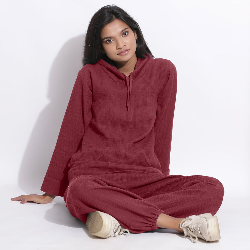Front View of a Model wearing Barn Red Hoodie Sweatshirt and Pants Set