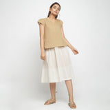 Front View of a Model wearing Beige A-Line Top and High Rise Skirt Set