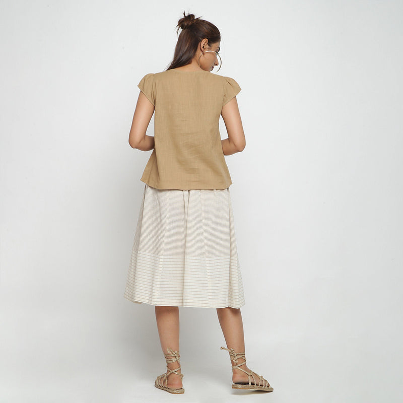Back View of a Model wearing Beige Puff Sleeve Cotton A-Line Top