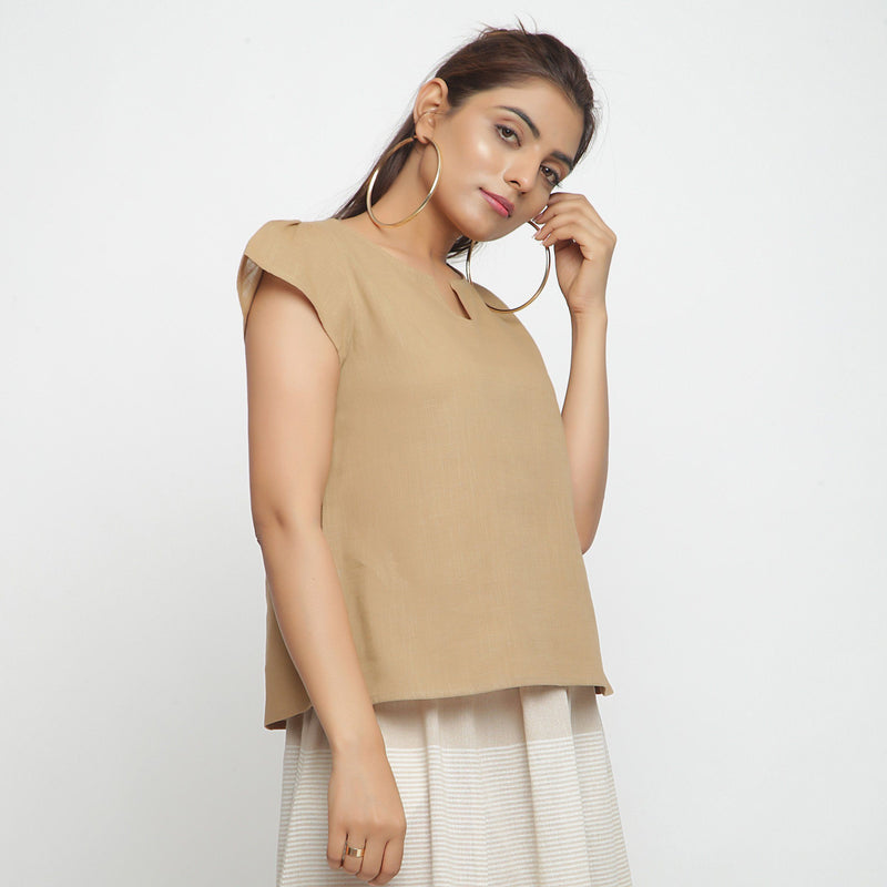 Right View of a Model wearing Beige Puff Sleeve Cotton A-Line Top