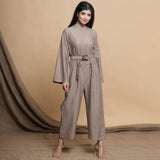 Front View of a Model wearing Beige Flared Sleeve Gathered Jumpsuit