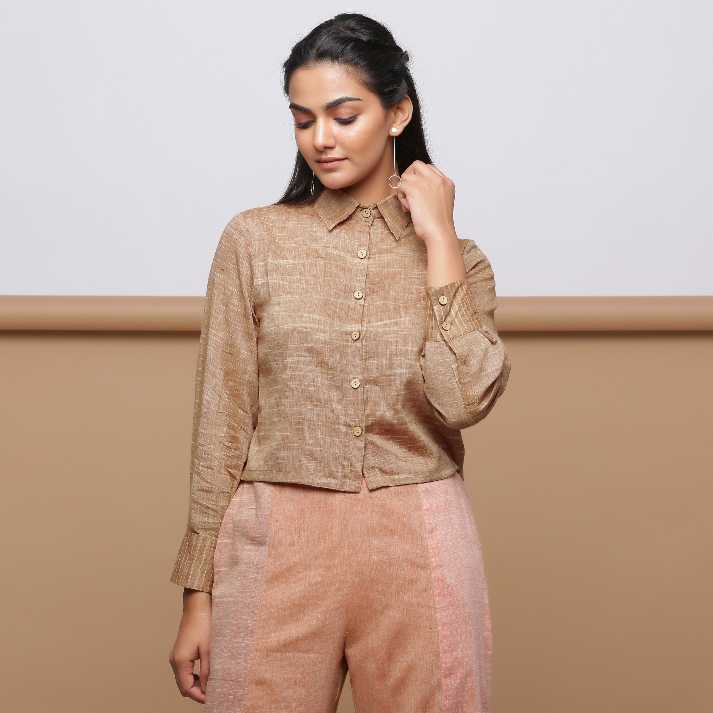 Front View of Model wearing Beige Handspun Button-Down Shirt
