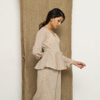 Right View of a Model wearing Beige Handspun Full Sleeve V-Neck Wrap Top
