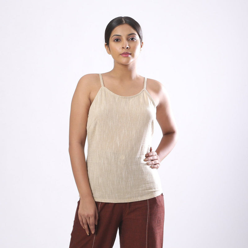 Front View of a Model wearing Solid Beige Basic Cotton Spaghetti Top