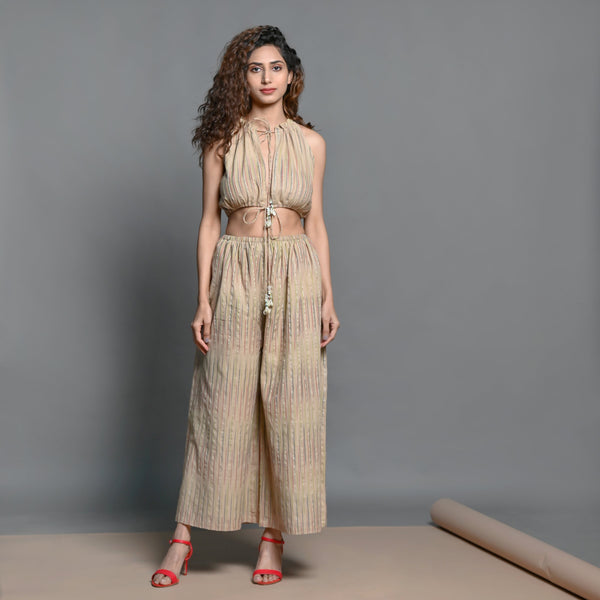 Front View of a Model wearing Beige Striped Handwoven Cotton Blouson Jumpsuit