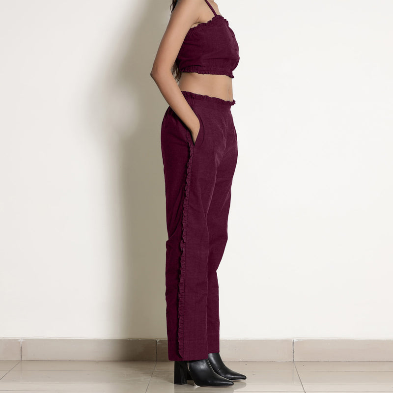 Right View of a Model wearing Warm Berrry Wine Frilled Straight Pant