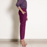 Right View of a Model wearing Warm Mulberry Frilled Waist Tapered Cotton Pant
