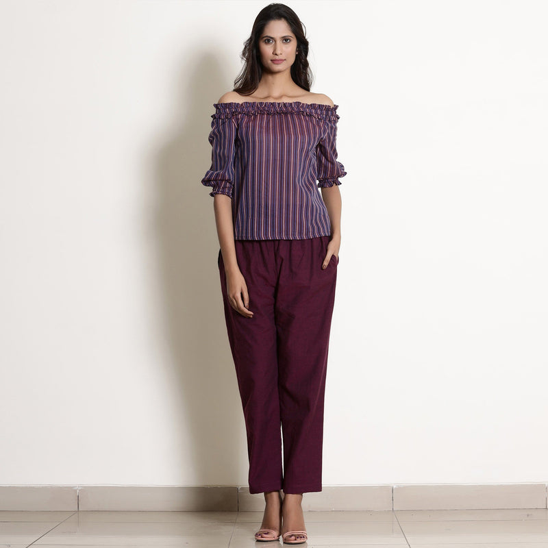 Front View of a Model wearing Berry Wine Off-Shoulder Top and Warm Pant Set