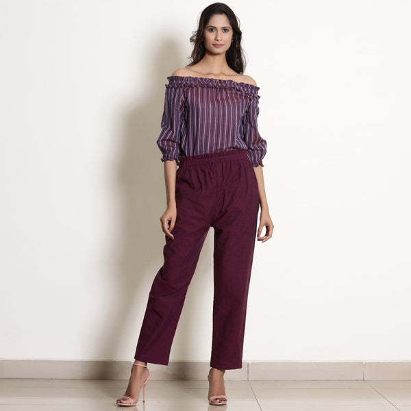 Front View of a Model wearing Berry Wine Off-Shoulder Top and Warm Pant Set