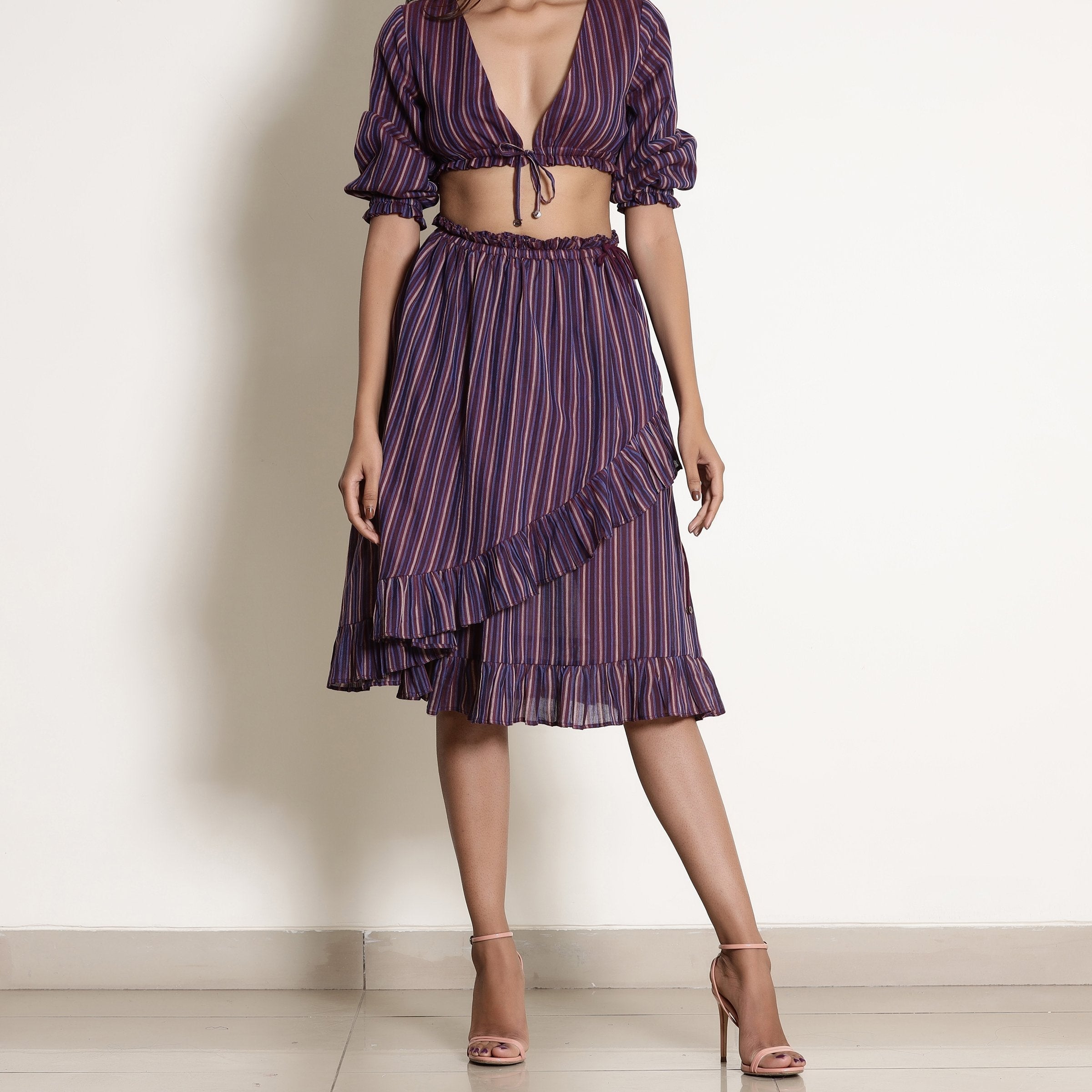 Front View of a Model wearing Berry Wine Reversible Frilled Wrap Skirt
