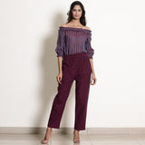 Front View of a Model wearing Berry Wine Striped Off-Shoulder Frilled Top