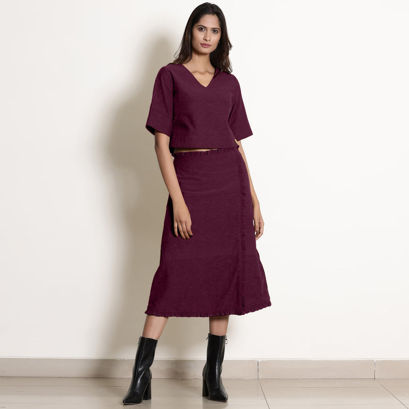 Front View of a Model wearing Berry Wine Wrap Top and A-Line Skirt Set