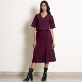 Front View of a Model wearing Berry Wine Wrap Top and A-Line Skirt Set