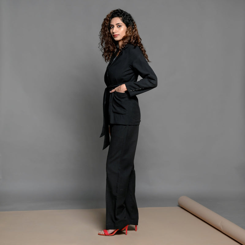 Left View of a Model wearing Black Handspun Cotton Pant Suit set