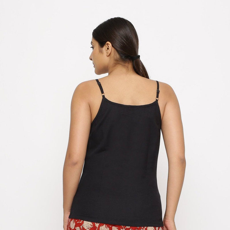 Back View of a Model wearing Black Cotton Flax Spaghetti Strap Top