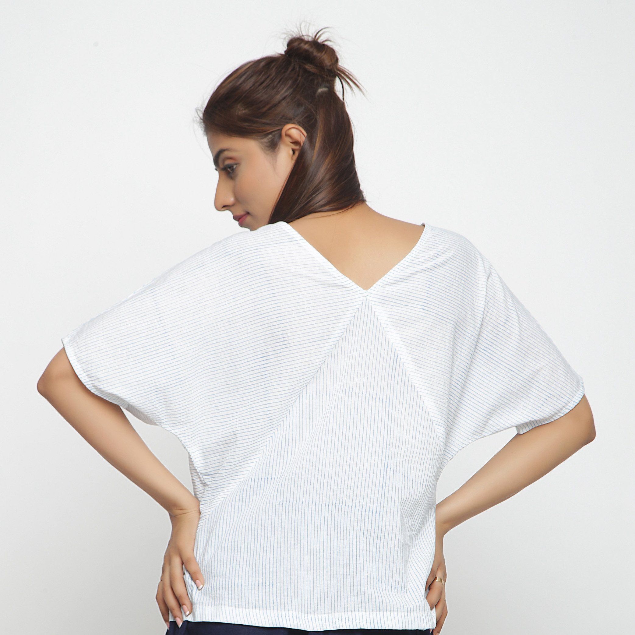 Back View of a Model wearing Block Printed Cotton Striped Paneled Top