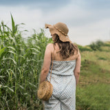 Back View of a Model wearing Tube Neck Block Print Straight Jumpsuit